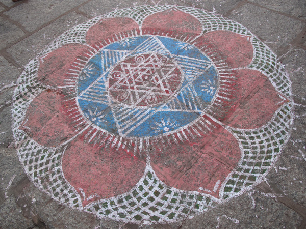 Kolam (Tamil) rice powder drawings